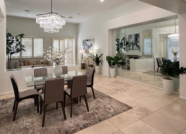 Stylish dining area in an older home with modern furnishings and decor.